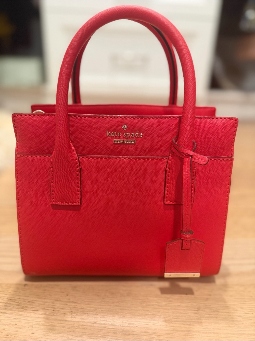kate spade red saffiano leather satchel with gold logo